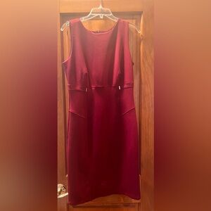 Red sleeveless dress.
